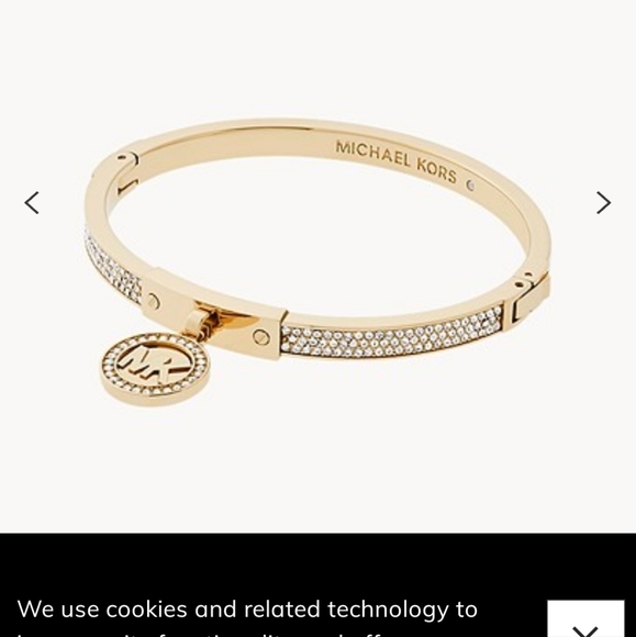 MICHAEL KORS GOLD-TONE PLATED STAINLESS STEEL PAVÉ HINGED BANGLE BRACELET - Picture 1 of 6